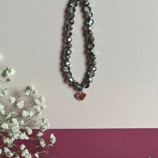 bracelet perle argenté et breloque 